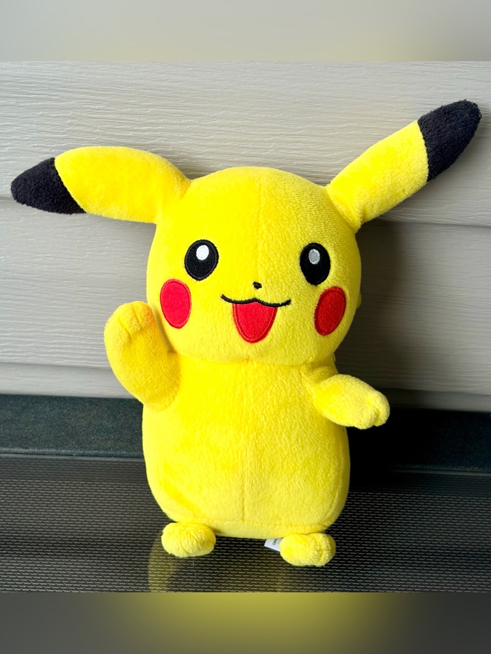 Pokémon Pikachu (2015) 9” Plush Toy in the "waving" pose/TOMY